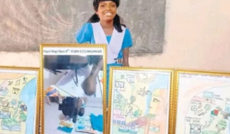 Payal Nag posing with her sketches