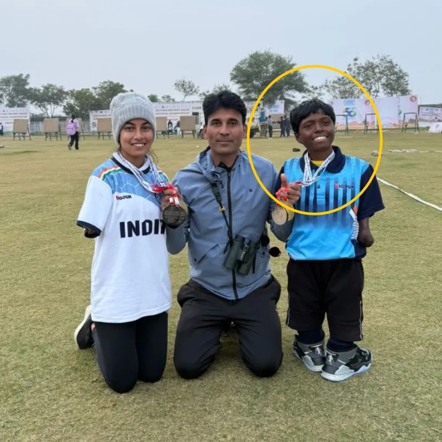 Payal Nag with her coach and medals