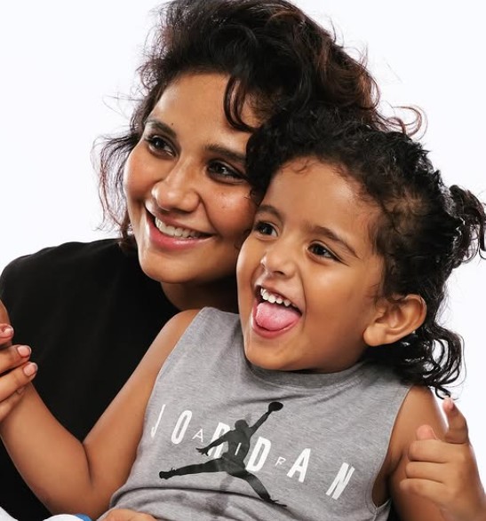 Preetisheel Singh D'souza with her son