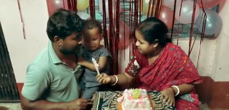 Pujarini Pradhan with her husband and son