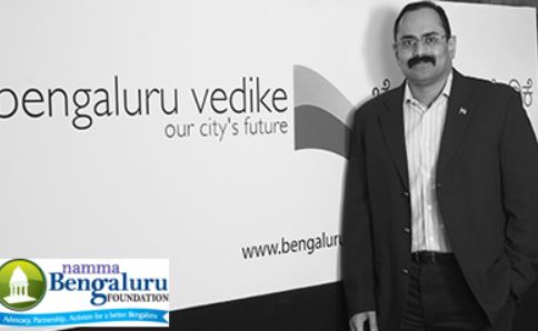 Rajeev Chandrasekhar posing with Bengaluru Vedhike's poster