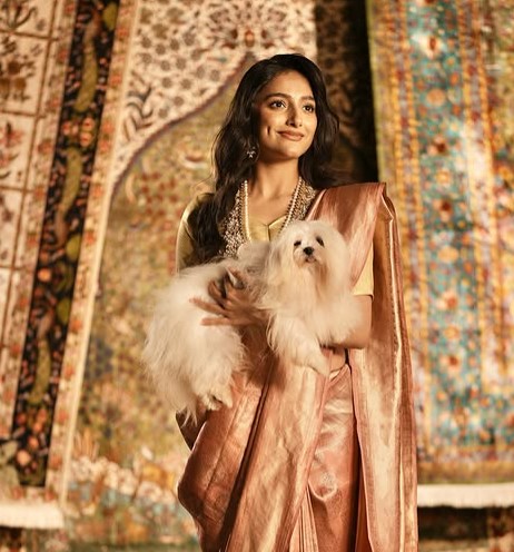 Rajnandini Pawar posing with her pet dog