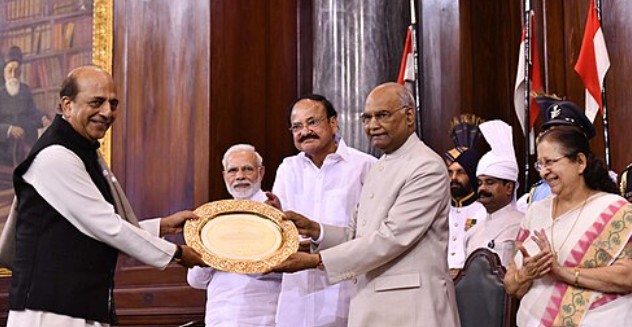 Ram Nath Kovind, the President of India, presenting the Outstanding Parliamentarian Award for the year 2016 to Dinesh Trivedi, at a function, at Parliament House, New Delhi
