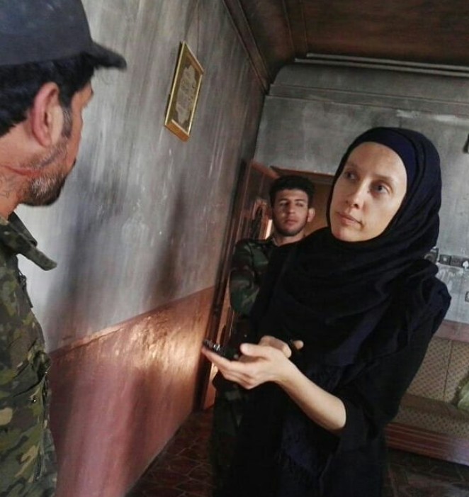 Shelly Kittleson while interviewing fighters west of Beiji, Iraq, in a village in the desert stretching westward to the Syrian border