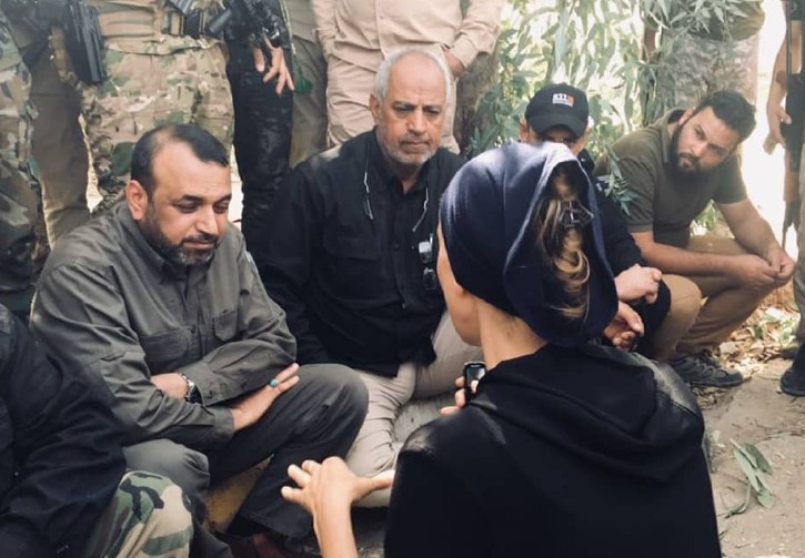 Shelly Kittleson while interviewing the then spokesman for the Popular Mobilization Units, Ahmad al-Asaadi, and the head of Liwa Ali al-Akbar, Ali Hamdani, in Hawija