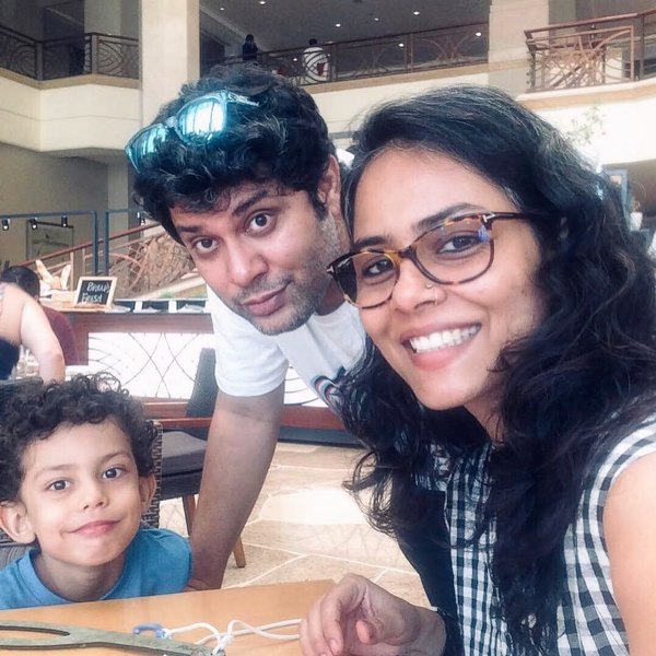 Sumit Roy with his wife and son