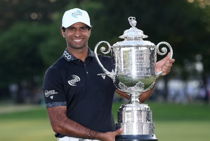 Aaron Rai Height, Age, Wife, Family, Biography » StarsUnfolded 14 Aaron Rai posing with his trophy after winning the 2026 PGA Championship