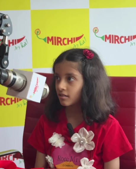 Anvi Hinge during a radio podcast