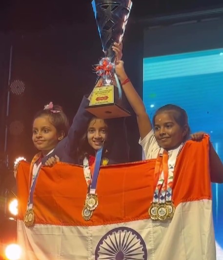Anvi Hinge (milddle) after winning the Western Asian Youth Chess Championships in Tajikistan