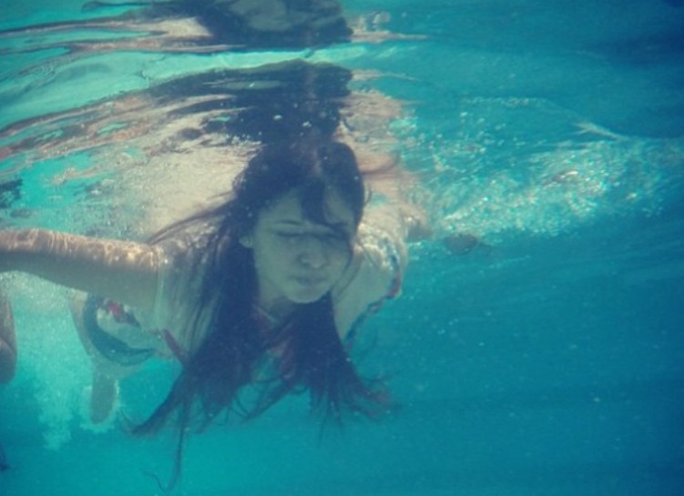 Basuri Chokshi while enjoying swimming