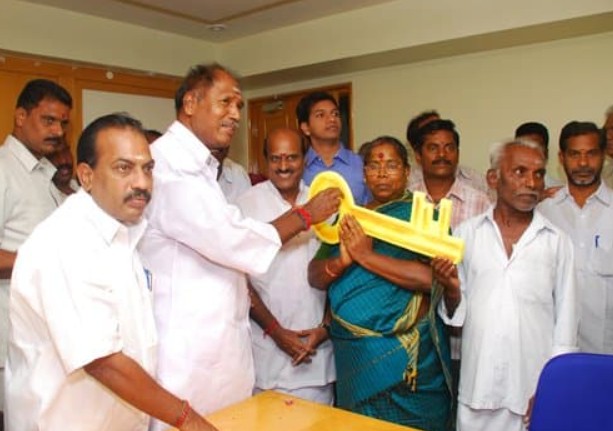 N. Rangaswamy donating houses to poor under 'Perunthalaivar Kamarajar Housing Scheme'