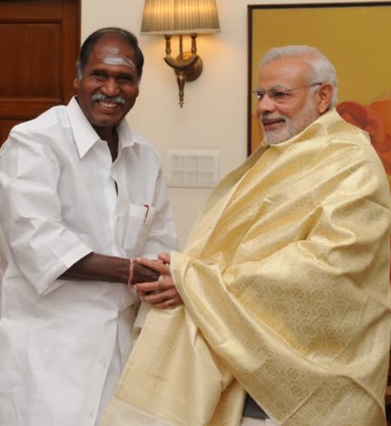 N. Rangaswamy posing with Narendra Modi