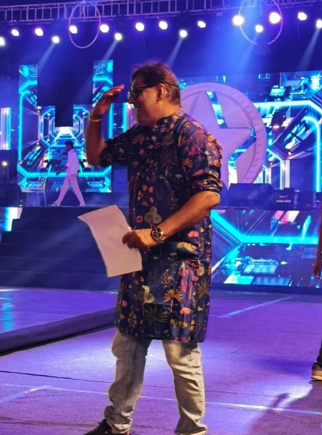 Nilesh Bhatt while hosting an event