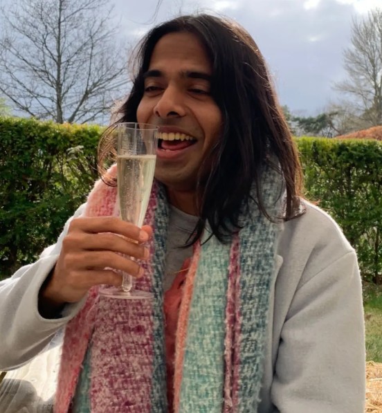 Q Manivannan while enjoying an alcoholic beverage