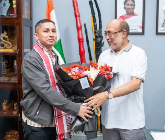 Rizwan Malik being honoured by the former Chief Minister of Manipur, N. Biren Singh