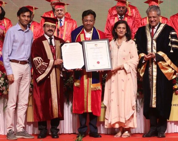 Hital Meswani receiving his doctorate degree