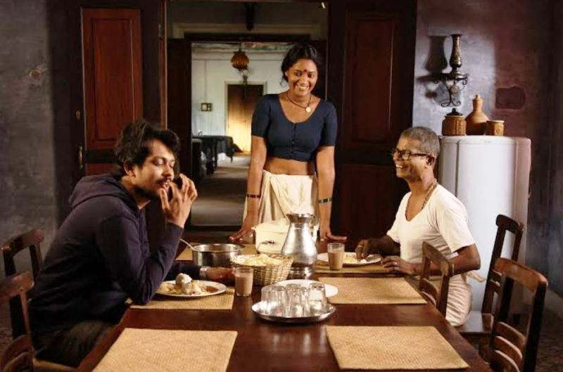 Indrans (right), along with Abhija Sivakala (centre), and Jason Chacko (left), in the film 'Mundrothuruth' (2016)