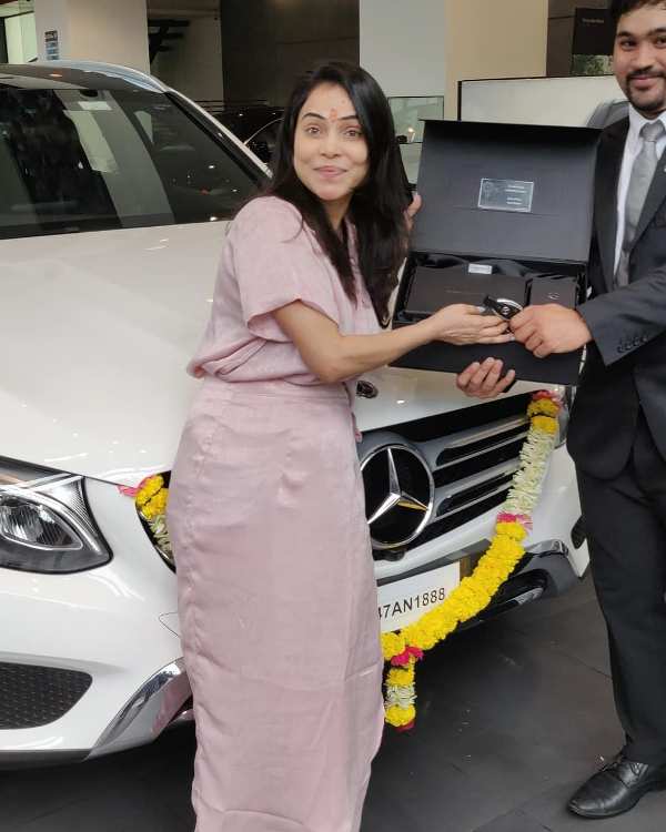 Nikita Rawal after buying a Mercedes-Benz