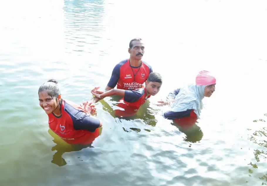 Saji Valasseril, while giving swimming training session