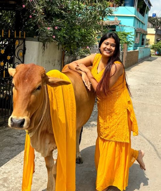 Sayoni Chakraborty with her pet Cow, Sundari