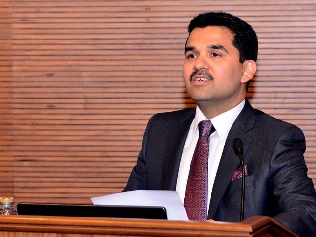 Shamsheer Vayalil while delivering a lecture