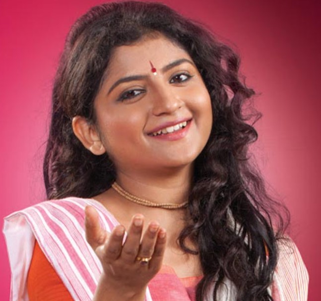 An old picture of Aditi Munshi while singing