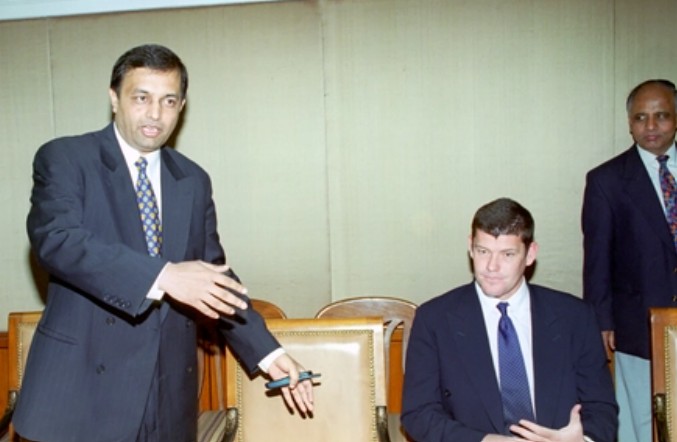 An old picture of Mahendra Nahata during a business meeting