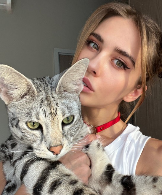 Angela Nikolau with her pet cat