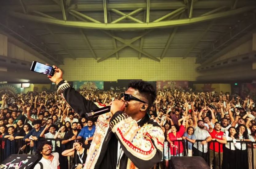 Arivu, while performing live on the stage