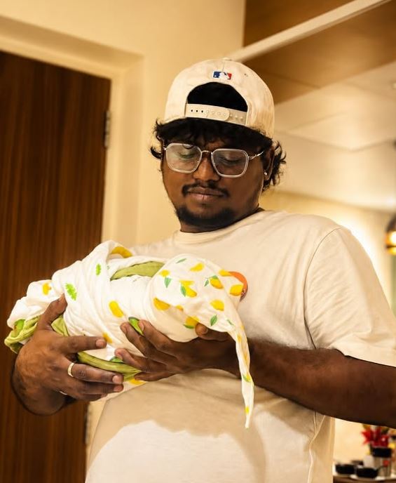 Arivu with his son