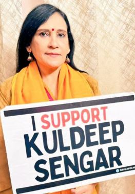 Barkha Trehan Height, Age, Husband, Children, Family, Biography » StarsUnfolded 3 Barkha Trehan holding a placard in support of Kuldeep Sengar
