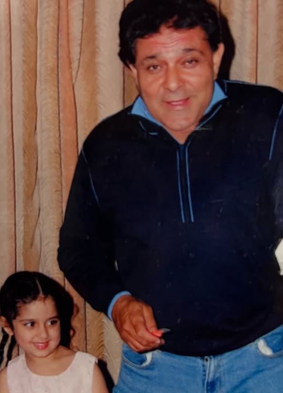 Childhood picture of Amy Bundhel with her father