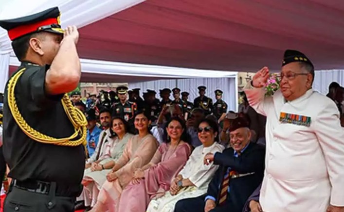 Dhiraj Seth Age, Wife, Children, Family, Biography » StarsUnfolded 6 Dhiraj Seth while saluting his father after taking the charge