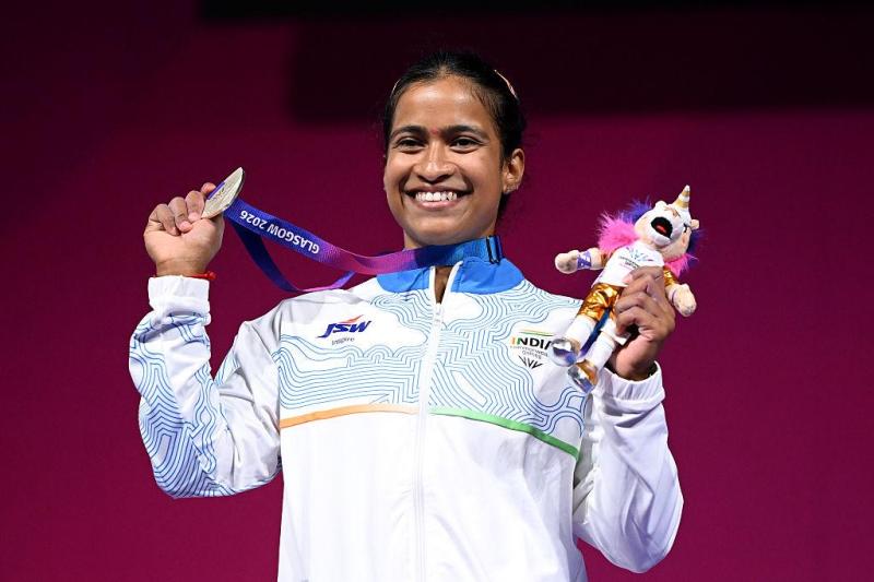 Gyaneshwari Yadav posing with her silver medal in Commonwealth Games (Glasgow) (Women's 53 kg category)