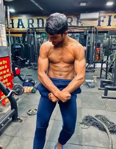 Harsh Tokas posing at a gym