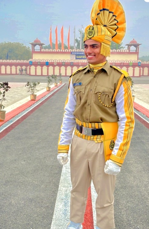 Harsh Tokas posing in CISF uniform