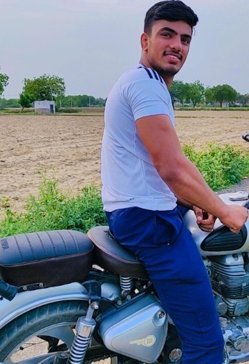 Harsh Tokas posing with his bullet