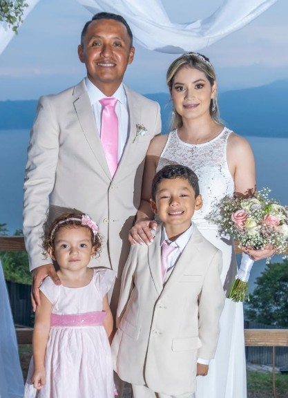 Iván Barton with his wife and children