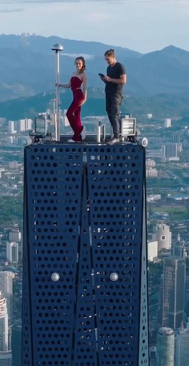 Ivan Beerkus and Angela Nikolau at the top of Merdeka 118 in Malaysia, the second-tallest building in the world