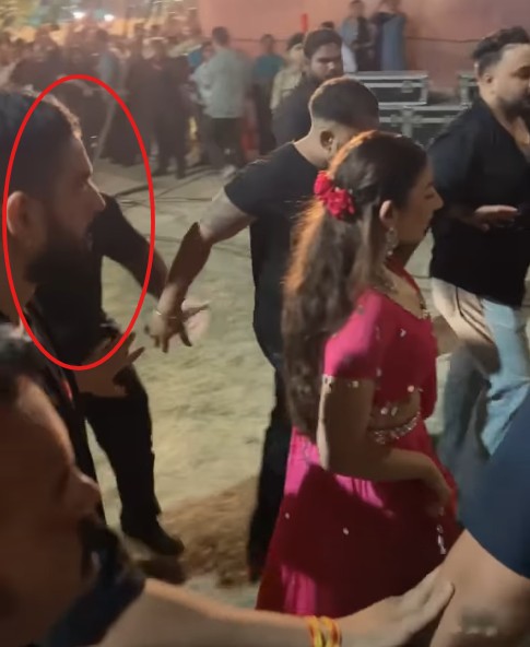 Jasmine Sandlas in pink lehnga before a concert with Shekhar Chaudhary (in her security)