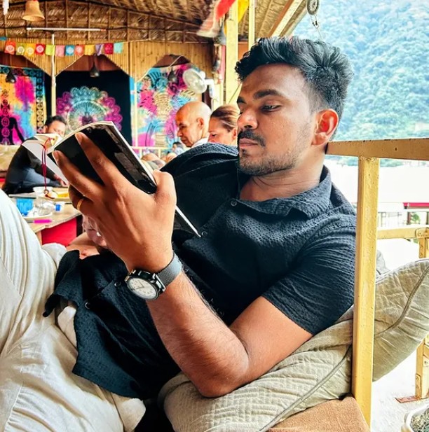 Kapil Dinkar while reading a book