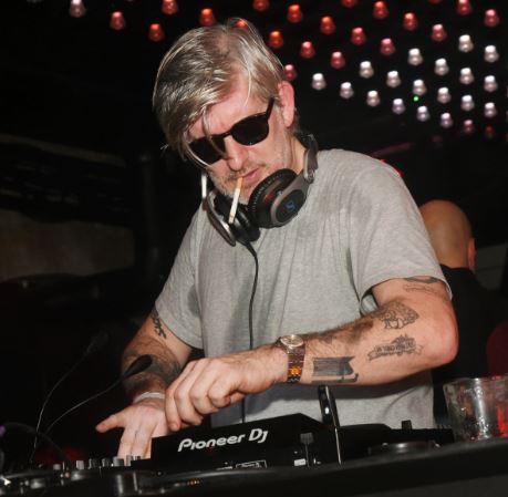 Kavinsky while smoking cigarette