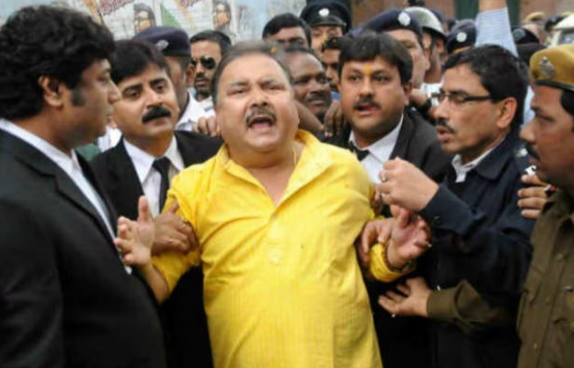 Madan Mitra Age, Wife, Children, Family, Biography » StarsUnfolded 8 Madan Mitra while in police custody