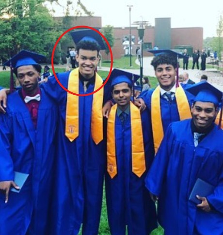 Spencer Jones posing on his graduation day