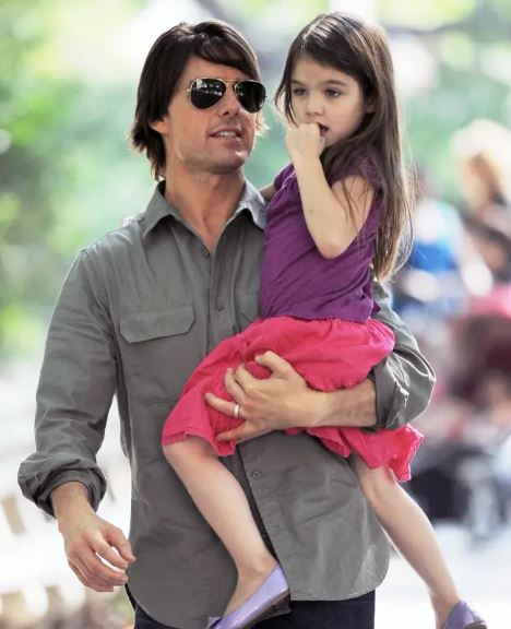 Suri Noelle with her father
