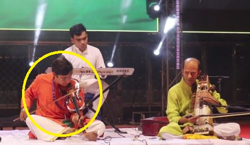 V. Kamakoti while playing violin in a music concert