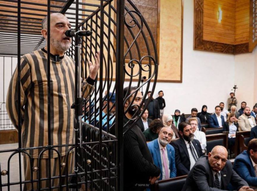 A picture of ongoing public trial of Atef Najib in Damascus