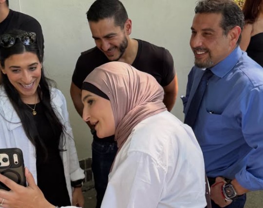 Abdul El-Sayed with Linda Sarsour (in hijab)