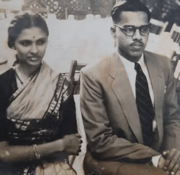 An old picture of H. V. Hande with his wife in the 1950s