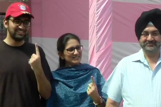 Birender Singh Dhanoa with his wife and son